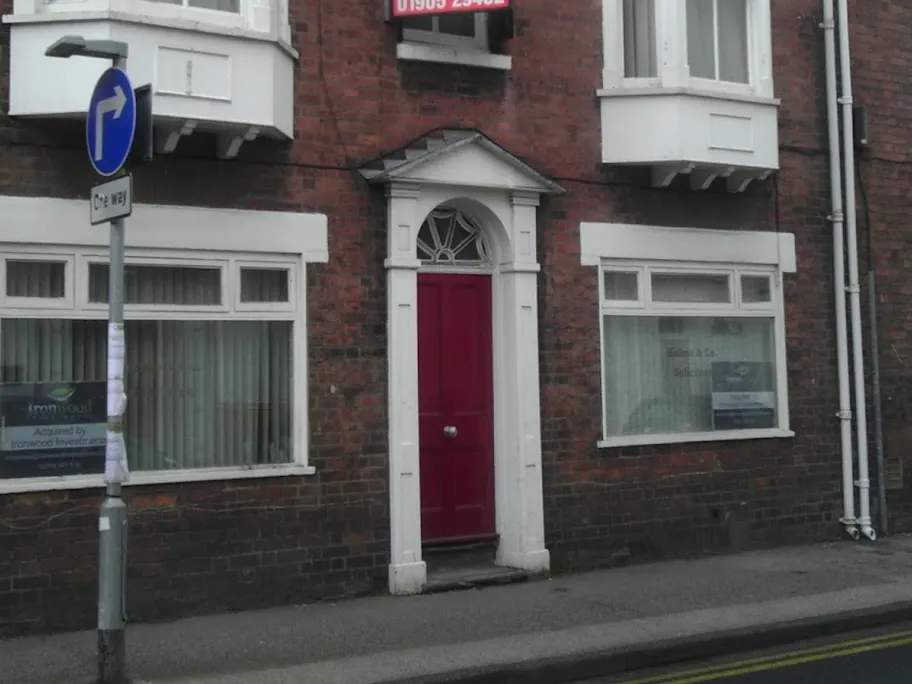 Front elevation of a Grade II listed brick building in Worcester before conversion