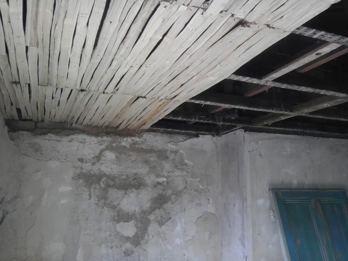 Stripped lath and plaster ceiling inside a listed conversion in progress